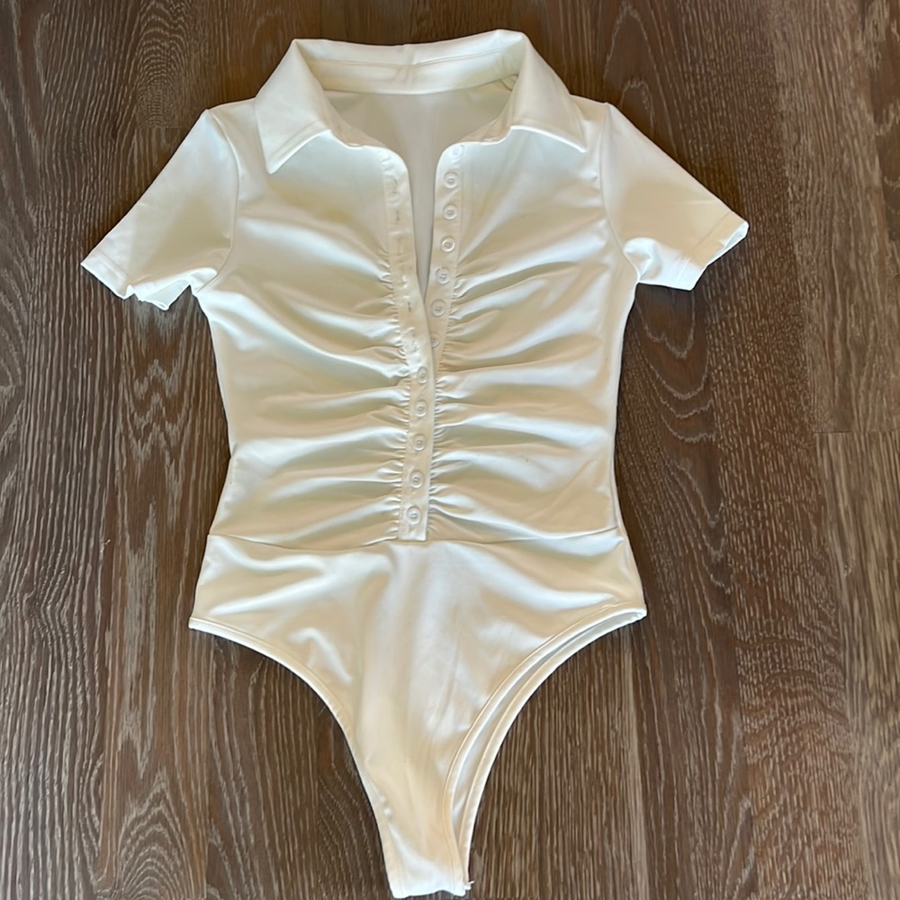 White button-up thong bodysuit